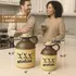 A rustic two-tone stoneware jug, topped with a cork and marked with the distressed text “XXX MOONSHINE” on its front