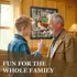 Grandfather and grandson playing darts in a cozy room with personalized lake house dartboard cabinet featuring custom name, vintage boat artwork, and rustic cabin-style design.