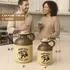 Two Irish Gold “Feelin’ Lucky” moonshine jugs in half-gallon and one-liter sizes displayed on a kitchen counter, with measurement labels and a couple enjoying drinks in the background.