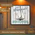 Personalized beach house dartboard cabinet with custom family name option, nautical sailboat design, and coastal wood finish for beach home game rooms.