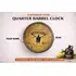 Custom moonshine barrel end clock showing personalized name year and distillery engraving on rustic barrel style clock face.