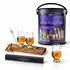 Man Can Whiskey Barrel Flight Set featuring three Glencairn Wee glasses on an authentic Scotch barrel stave, one additional glass off the board, Glencairn pipette, and premium gift can packaging displayed on a clean white background.